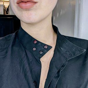 Oversized blouse with architectural point collar